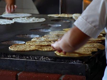 preparing tortillas