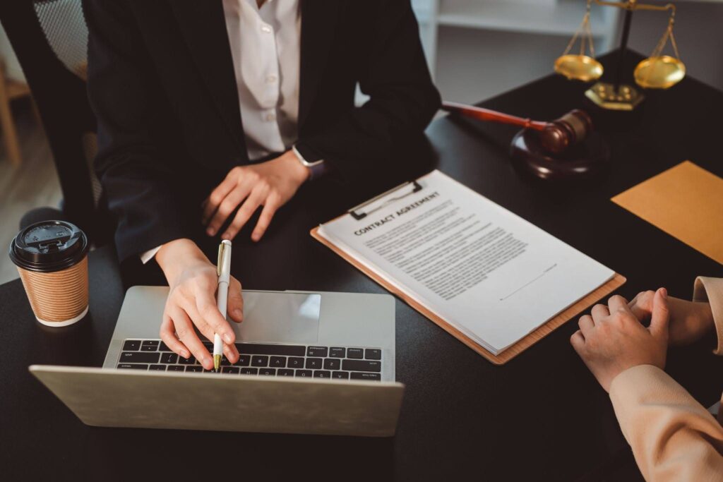 an attorney discussing legal matters with a client