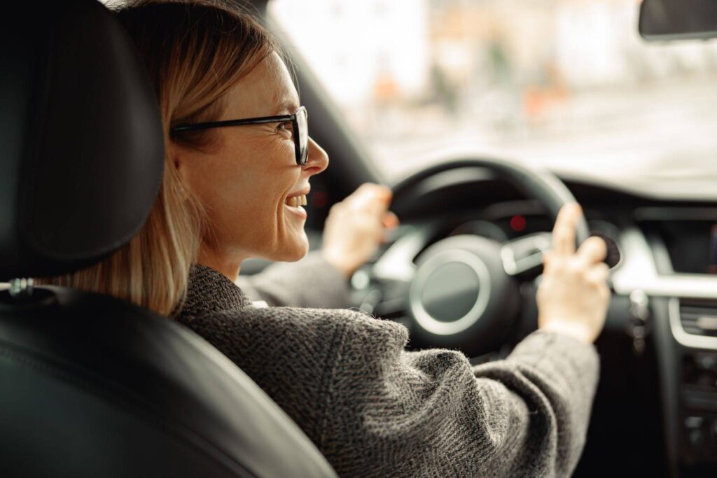 a woman drives a car she used as collateral for a personal loan