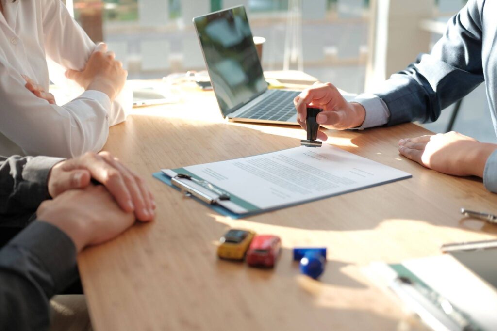 a couple applying for a car title loan