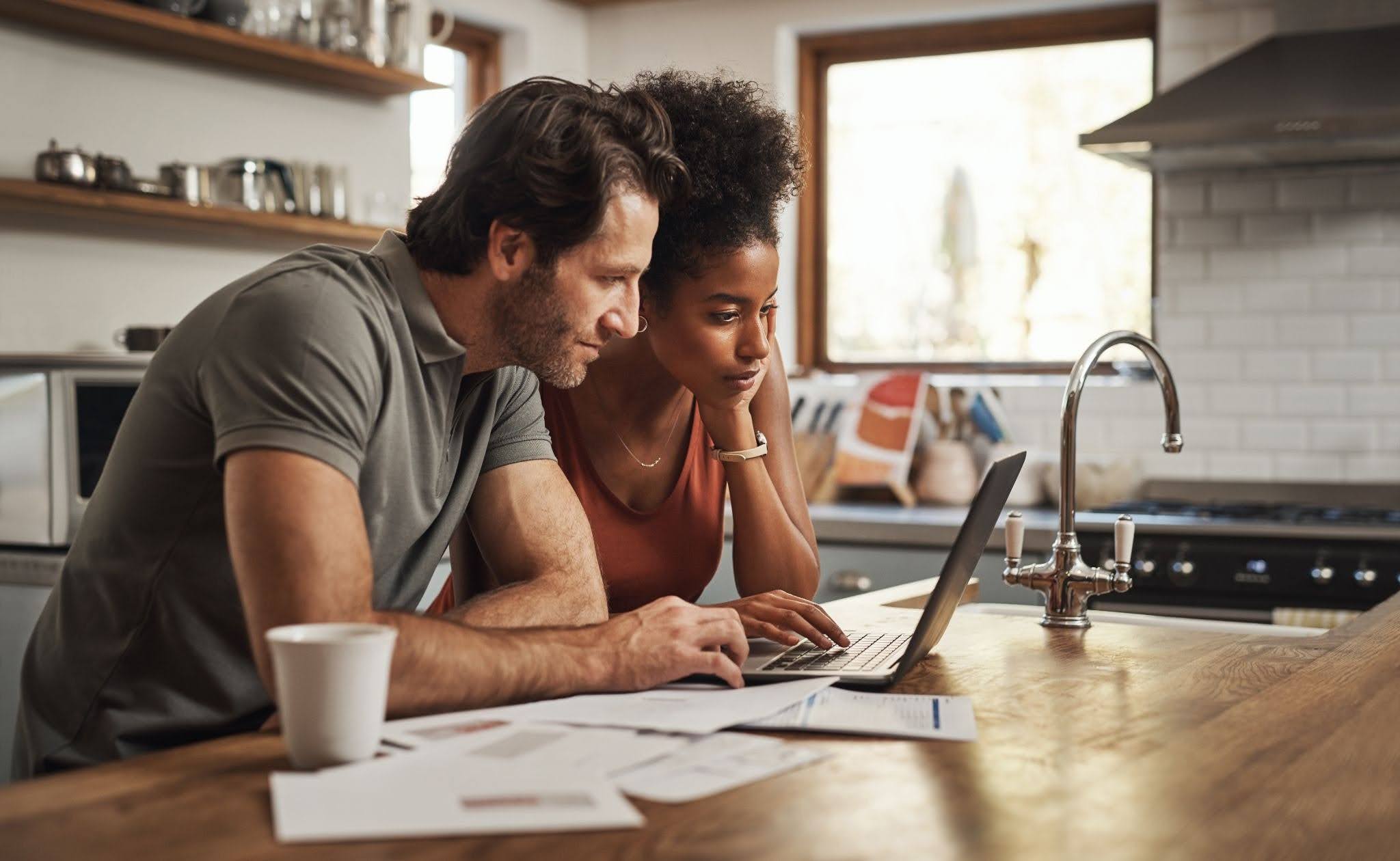 a couple checking whether they can get a title loan with expired tags